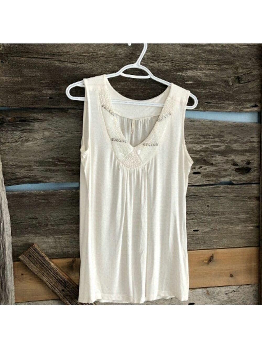 𝅺olivia Noon sleeveless top size Med